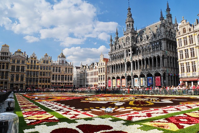 Beautiful European square with floral pavements and historic buildings
