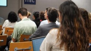 People listening to a presentation