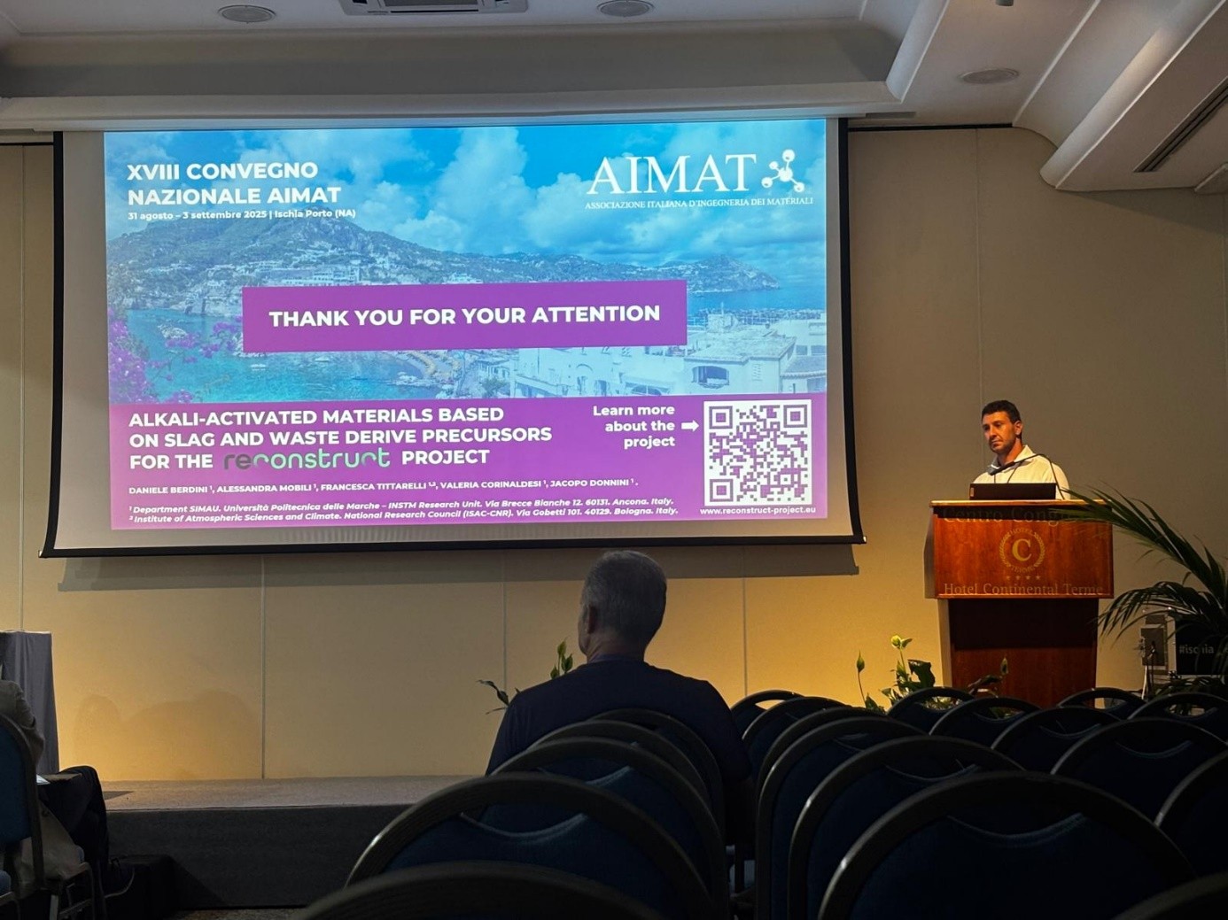 Man presenting at conference